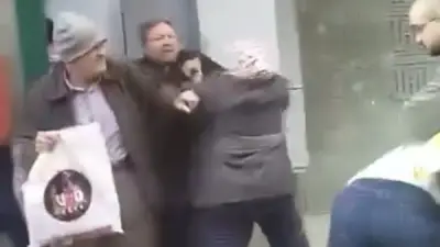 خناقة بين سيدة ورجل أمام ماكينة فيزا بالمحلة في نهار رمضان