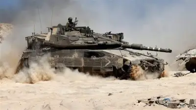 إسرائيل تعزز قواتها على الحدود مع لبنان وتعلن استهداف بيروت