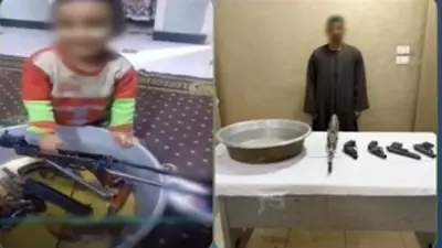 القبض على عاطل بتهمة تصوير نجله أثناء فك وتركيب بندقية آلية بأسيوط