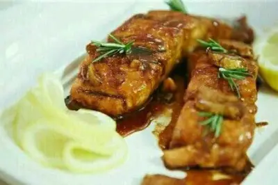 سمك فيليه مشوي بتتبيلة شهية.. وجبة صحية ولذيذة في المنزل