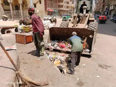 إلزام المحال التجارية بالجيزة بوضع صناديق قمامة أمام واجهاتها