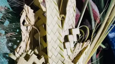 أحد الشعانين: لماذا يمسك الأقباط بسعف النخيل في احتفالات الكنيسة؟