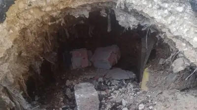 هبوط أرضي محدود بطريق دفنو بالفيوم دون إصابات أو خسائر مادية