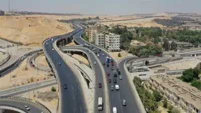 إعادة فتح الطريق الدائري بمحور المنيب بعد أعمال رفع الكمر المعدني