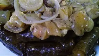 طريقة عمل طاجن ورق العنب بالكوارع لعيد الأضحى