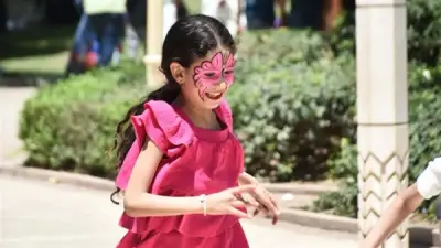 الإسكوتر ورسومات الوجه وسباقات الجري.. الأطفال يرسمون البهجة في حديقة الأزهر