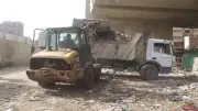 رفع 1140 طن قمامة من بؤرتين بترعة الزمر والمنيب في الجيزة
