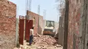 محافظ أسيوط يعلن إزالة 12 حالة تعدٍ على الأراضي الزراعية وأملاك الدولة