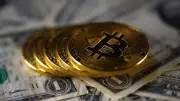 بيتكوين تهوي دون 77 ألف دولار مع تجدد التوترات بالشرق الأوسط