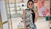 مي عمر تتألق بفستان زيتي أنيق في أحدث ظهور عبر إنستجرام