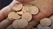 الجنيه المعدني الجديد يدخل التداول في الأسواق المصرية اليوم