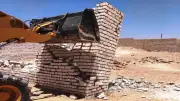 حملات مكثفة لإزالة التعديات على أراضي الدولة بأسوان