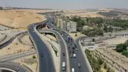 إعادة فتح الطريق الدائري بمحور المنيب بعد أعمال رفع الكمر المعدني