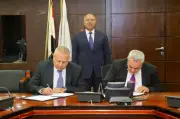 مذكرة تفاهم لتمويل وتصميم وصيانة الميناء الجاف والمنطقة اللوجستية في برج العرب