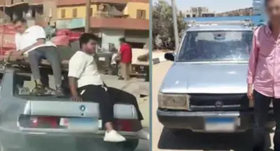 ضبط قائد سيارة سمح لشخصين باعتلاء سيارته بالقاهرة
