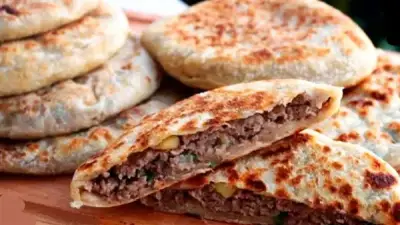 طريقة عمل الحواوشي في العيش البلدي لوجبة غداء سريعة واقتصادية