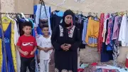 بائعة ملابس مستعملة تناشد بتوفير معاش ومصدر دخل ثابت في المنيا