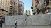 إخلاء عقارين مائلين في الهرم وتشكيل لجنة هندسية لتأمين السكان