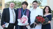 سلاف فواخرجي تحتفل بتخرج ابنها علي من الجامعة الأميركية بالقاهرة