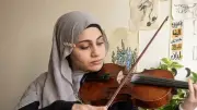 من بورسعيد إلى قمة الجمهورية.. طالبة سورية تفوز بالمركز الأول في العزف على الكمان