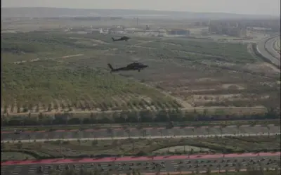 تصوير جوي لهليكوبتر وموكب رئاسي خلال وصول السيسي لمقر القيادة الاستراتيجية